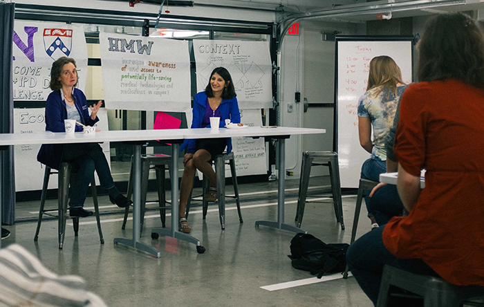 Dr. Bonnie Salomon and Dr. Ruchi Gupta field questions from EDI and IPD student teams.