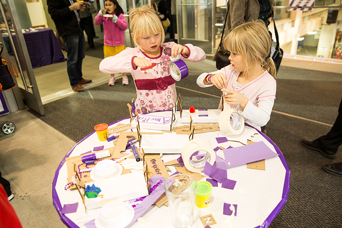 Segal Associate Director Kim Hoffman's daughters work relentlessly on making the most spirited floats. 